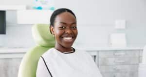 Young woman smiling and showing off her shiny, white teeth after Zoom! Teeth Whitening treatment
